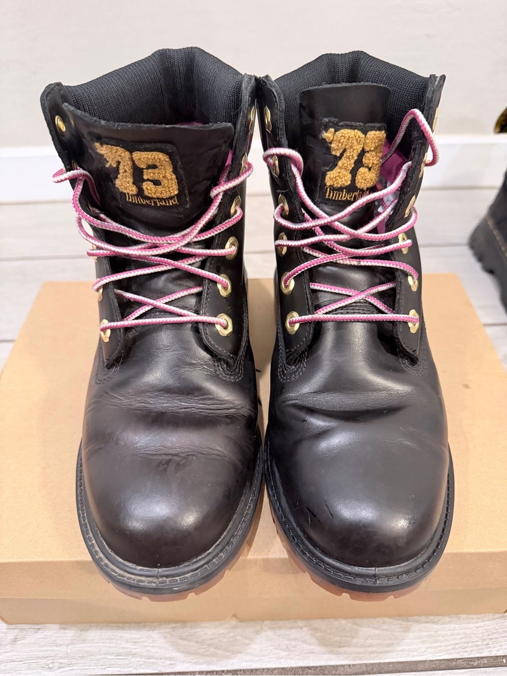 Timberland Black Leather Boots with Pink Laces and Gold Accents